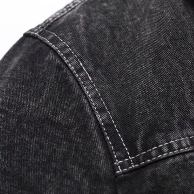 Stylish black denim jacket, a classic unisex outerwear piece for warmth and versatility.