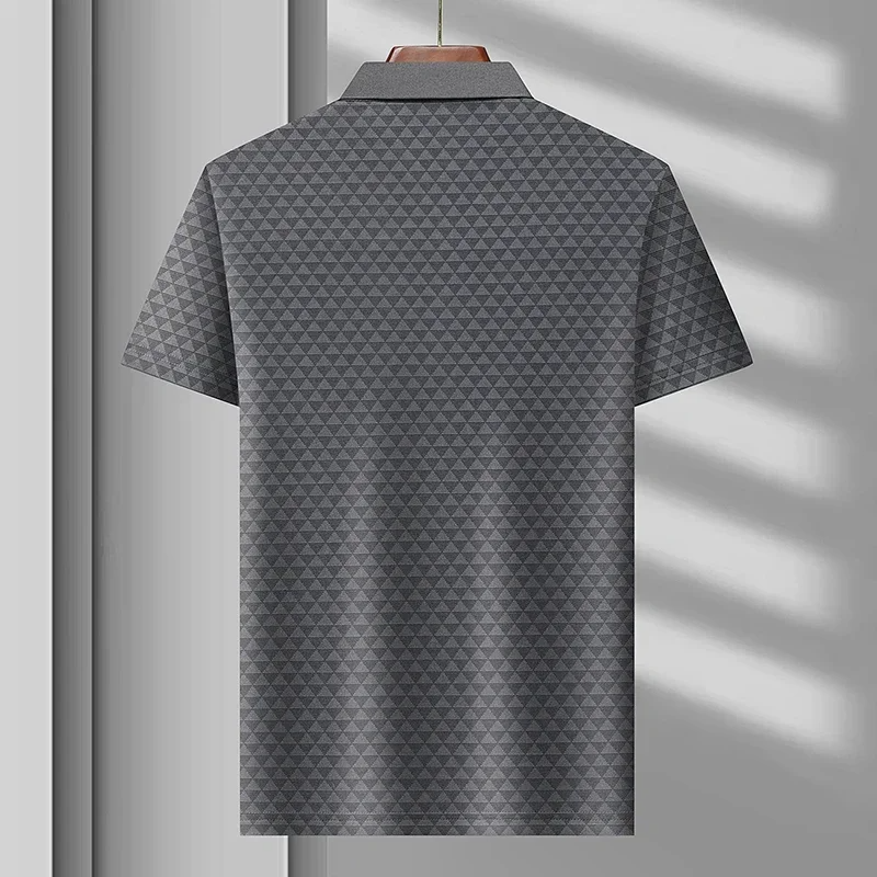 Relaxed fit men's classic polo shirt with a subtle diamond pattern, short sleeve, perfect for casual comfort.
