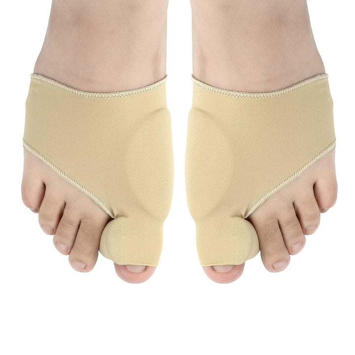 Foot wearing a unisex bunion corrector, visibly straightening the big toe & providing hallux valgus alignment.