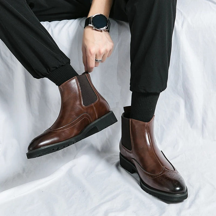High-quality men's chelsea boots, durable construction with distinct brogue for lasting style.