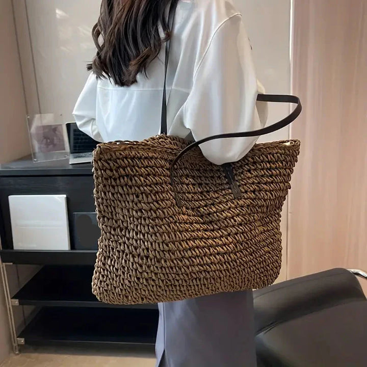 Classic oversized straw beach tote bag for women, a versatile accessory for summer & travel.