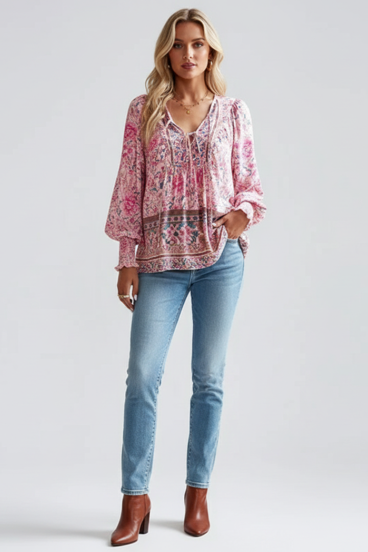Flowy women's floral blouse, V-neck, long sleeve. Versatile top for casual or elegant spring/summer outfits.