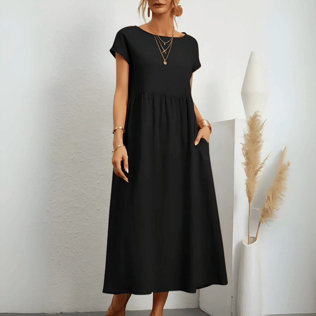 Elegant women's short sleeve O-neck maxi dress with a vintage style and comfortable flowy pleated skirt.