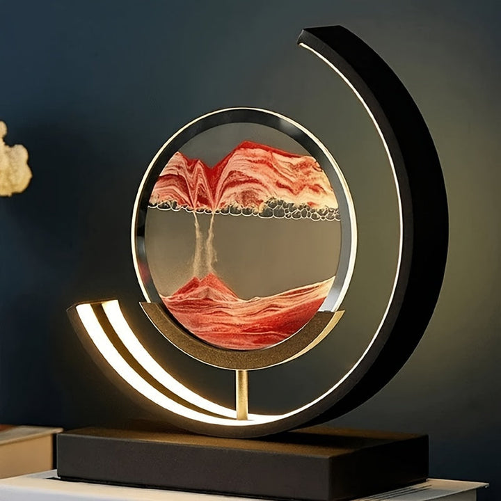 Decorative LED hourglass lamp with flowing sand art, perfect for desk or home decor.