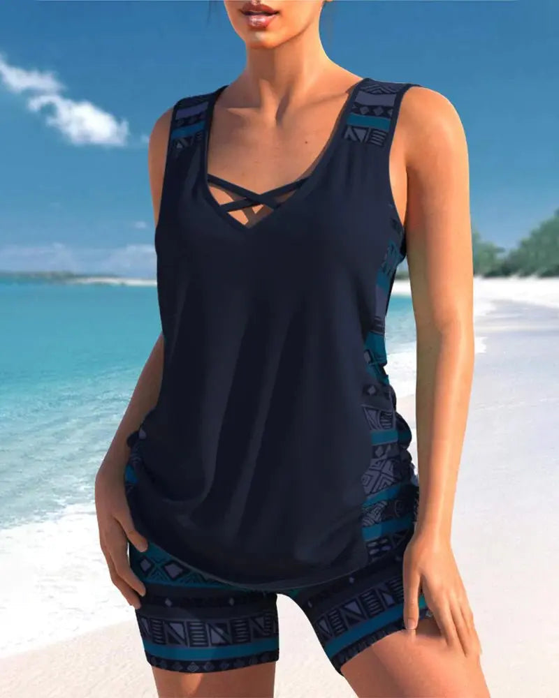 Dark blue women's tankini swimsuit set, flattering design with tummy control for comfortable beach & pool days.