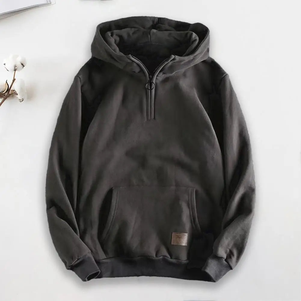 Grey quarter-zip men's hoodie, featuring soft fabric for comfortable and stylish casual wear.