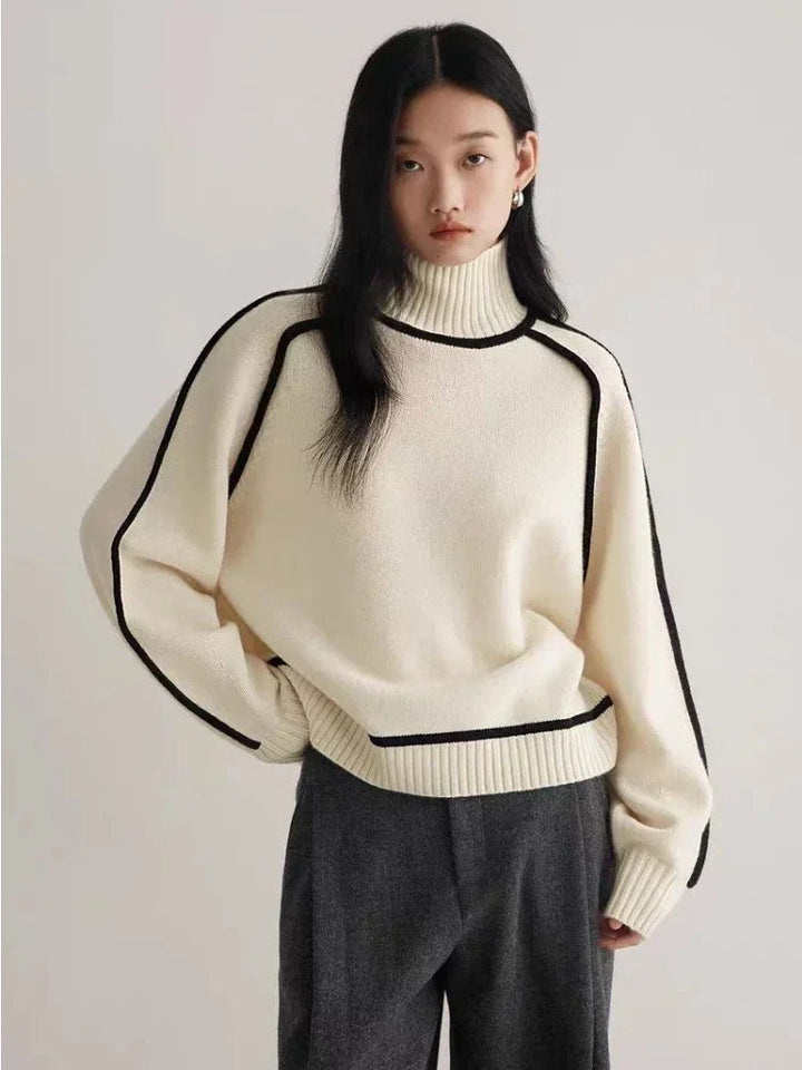Trendy fall fashion women's turtleneck sweater with unique contrast seam details. Chic & comfortable.