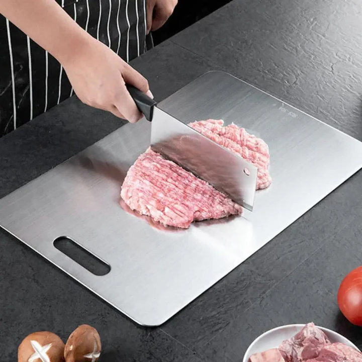 Portable titanium chopping board; hygienic for kitchen & outdoor food prep. Easy to clean & highly durable.
