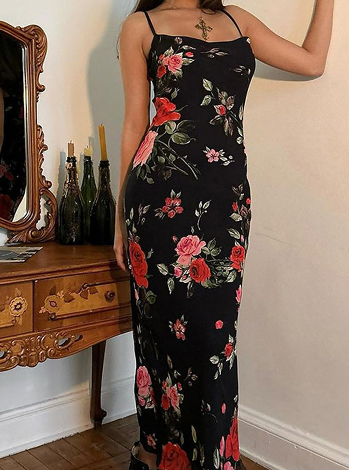 Flowy women's summer maxi dress featuring a beautiful floral print and delicate spaghetti straps.