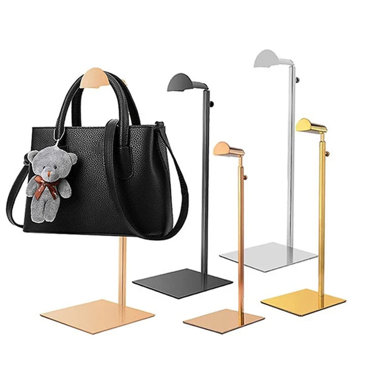 Silver adjustable handbag stand for closet organization & luxury bag display. Stainless steel purse holder.