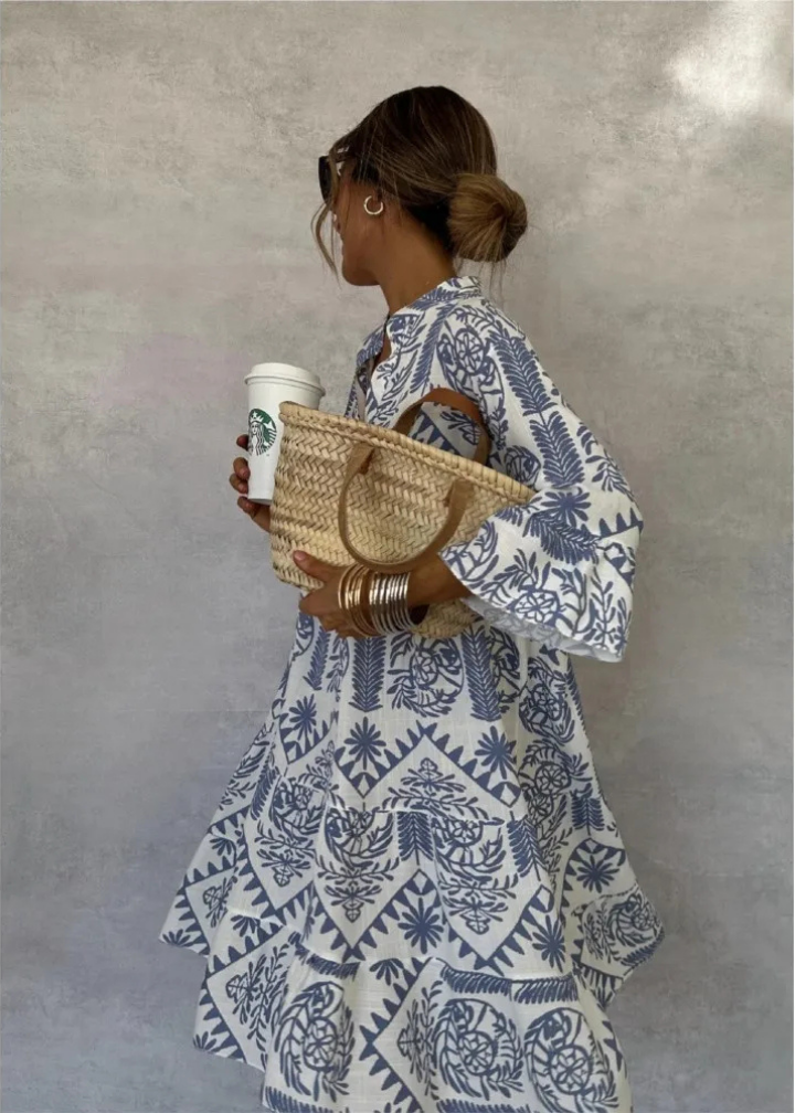 Women's boho print oversized flowy midi dress with long sleeves, perfect for casual summer wear.