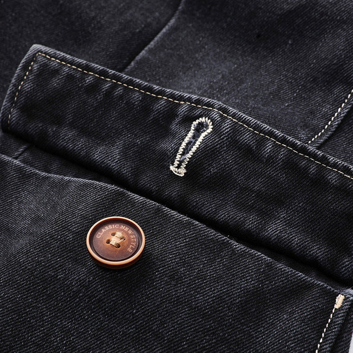 Modern men's classic dark wash trucker jacket, a must-have for trendy casual fashion.