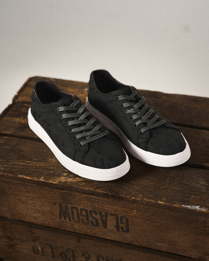 Clean white men's everyday sneakers, offering polished style and ultimate comfort for versatile fashion.