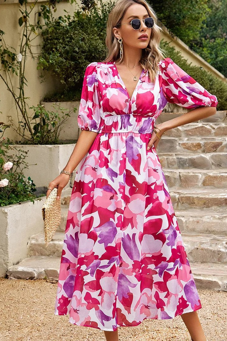 Stylish puff sleeves on a women's V-neck floral midi dress, ideal for spring wear.