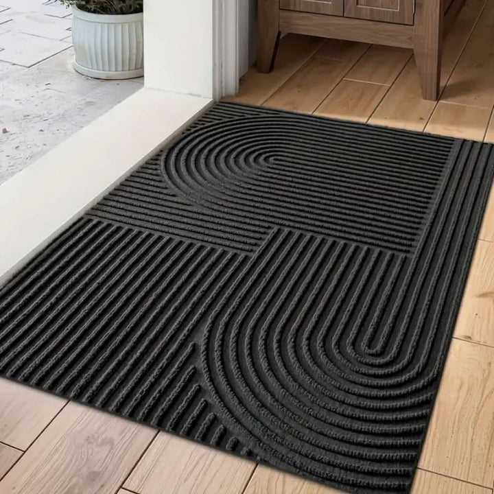 Elegant absorbent floor mat with modern line pattern, ideal for entryways & home decor.