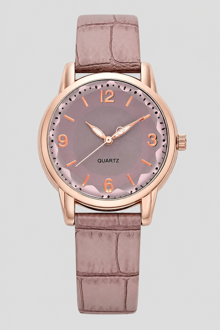 Elegant women's classic dress watch with an embossed strap, perfect for a sophisticated look.