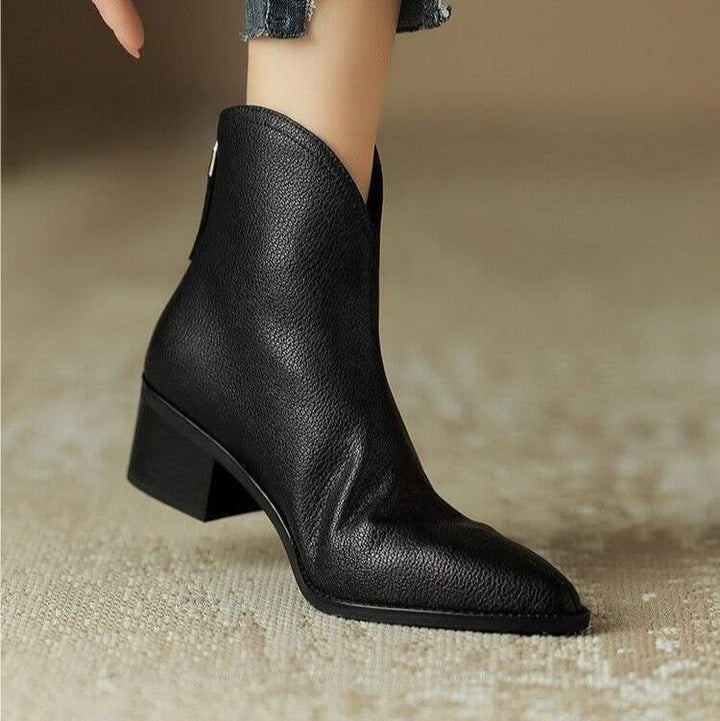 Modern pointed toe ankle boots for women, a fashionable choice for sophisticated ensembles.