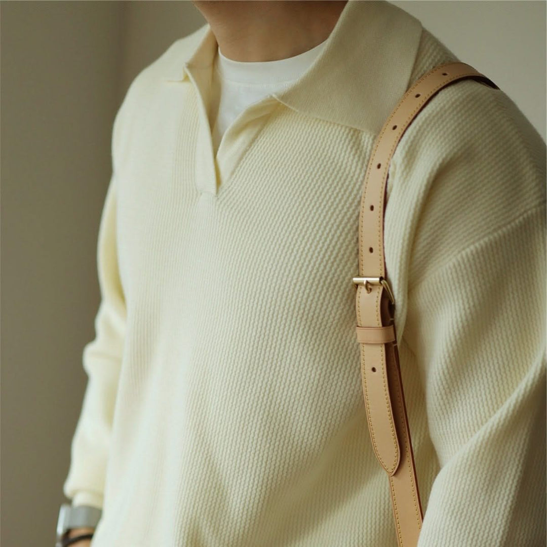 Comfortable cream knit polo shirt for men. Soft, breathable fabric in a classic fit for versatile everyday fashion.