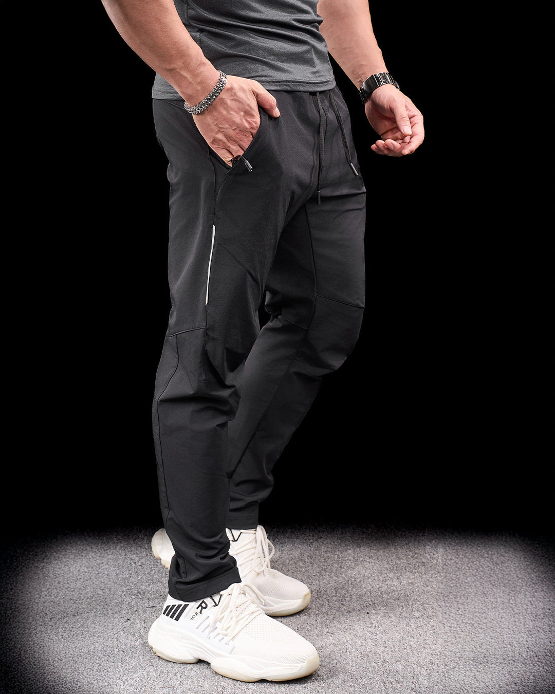 Grey men's active hiking pants, quick-dry stretch bottoms perfect for challenging trails.