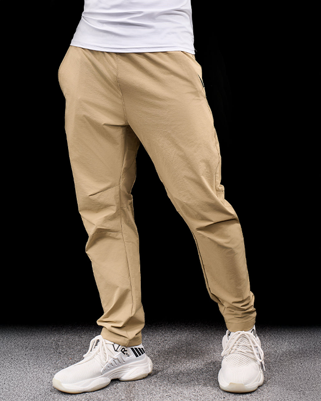 Comfortable men's activewear bottoms, stretch adventure pants for hiking and versatile outdoor use.