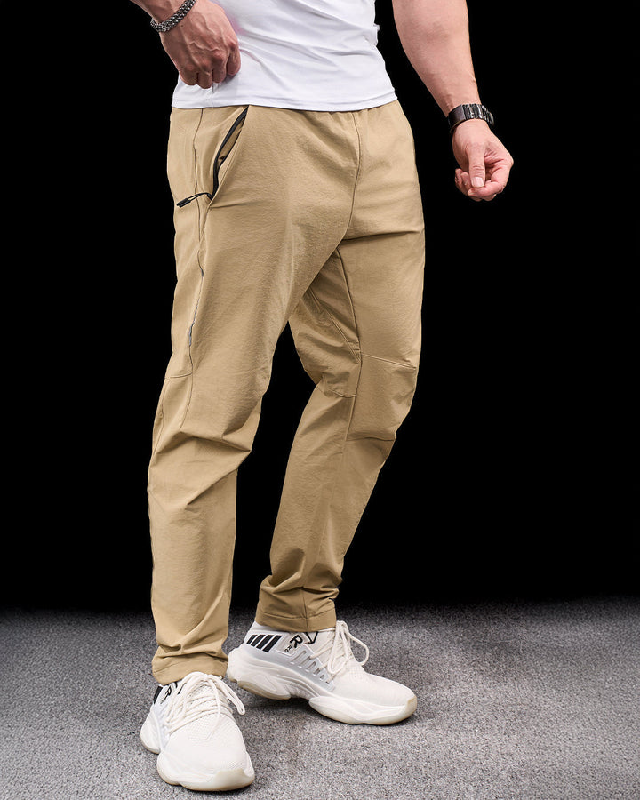 Black men's stretch adventure pants, quick-dry and flexible, great for outdoor and active use.