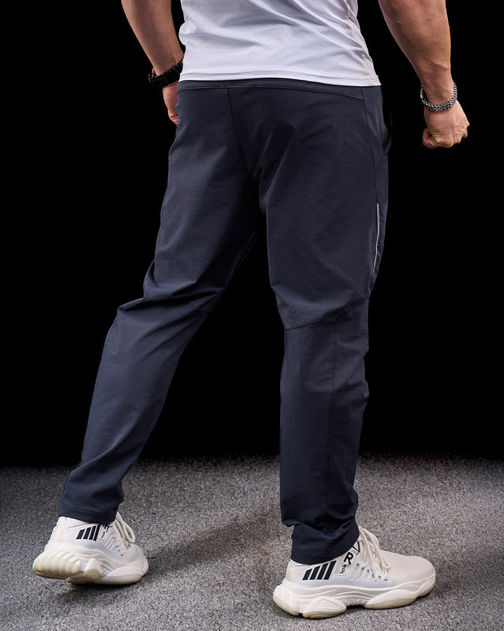 Khaki men's Dolomite adventure pants, designed for hiking with quick-dry and stretch features.