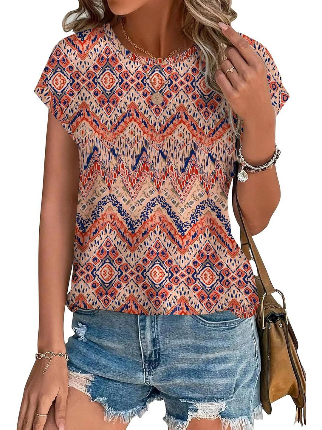 Lightweight women's cap sleeve top, all-over botanical leaf print, perfect for summer fashion.