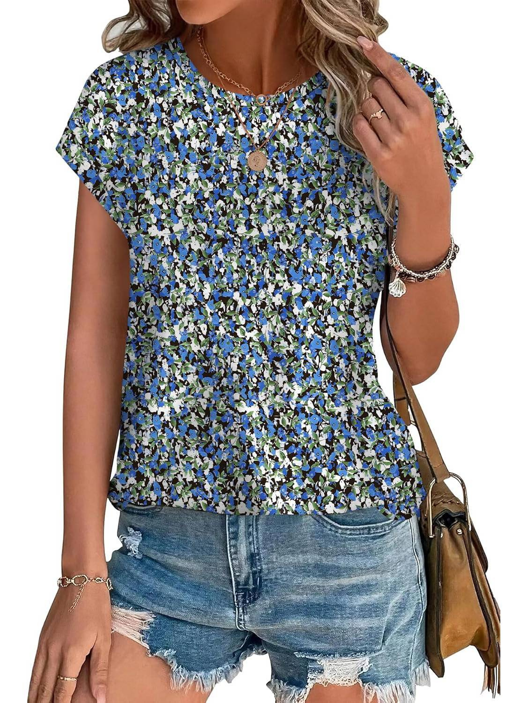 Artistic women's botanical print top, cap sleeve, ideal for a relaxed summer look.