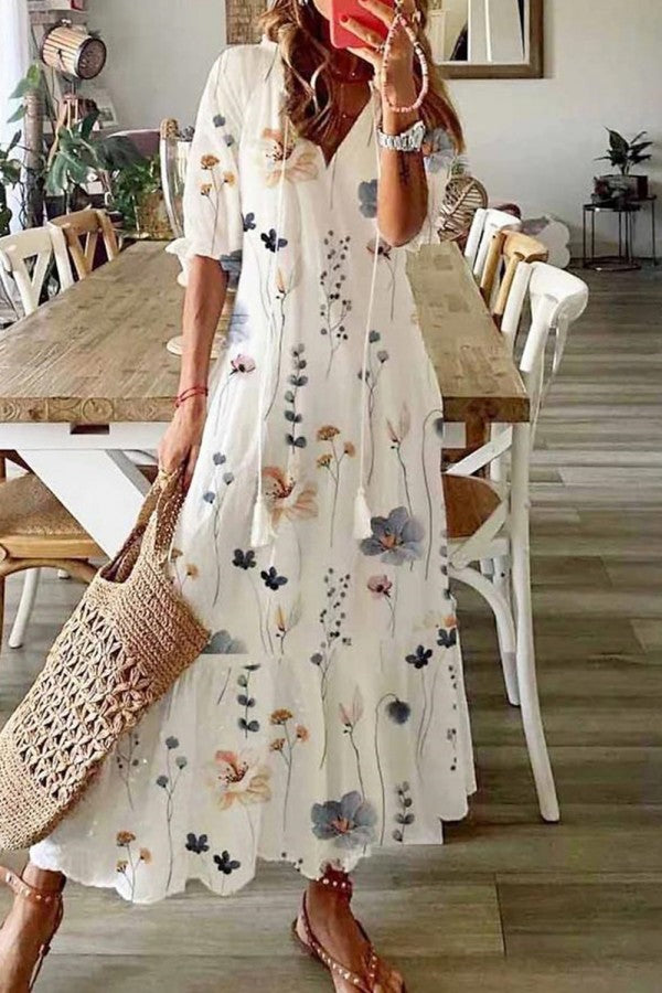 Women's floral tassel V-neck maxi dress, perfect for summer, beach, or casual wear.