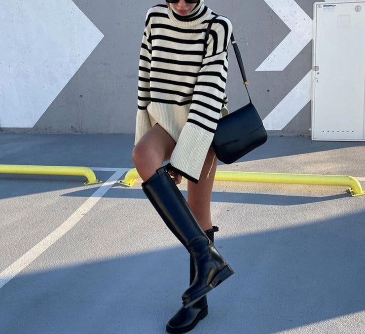 Classic women's fall/winter turtleneck sweater, made from cozy knitwear for elegant and comfortable fashion.