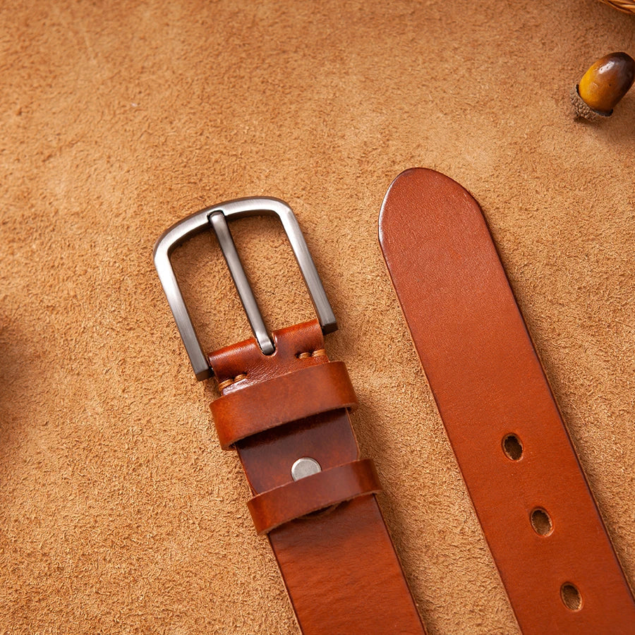 Brown men's genuine leather belt, high-quality cowhide with a unique vintage-style metal buckle.