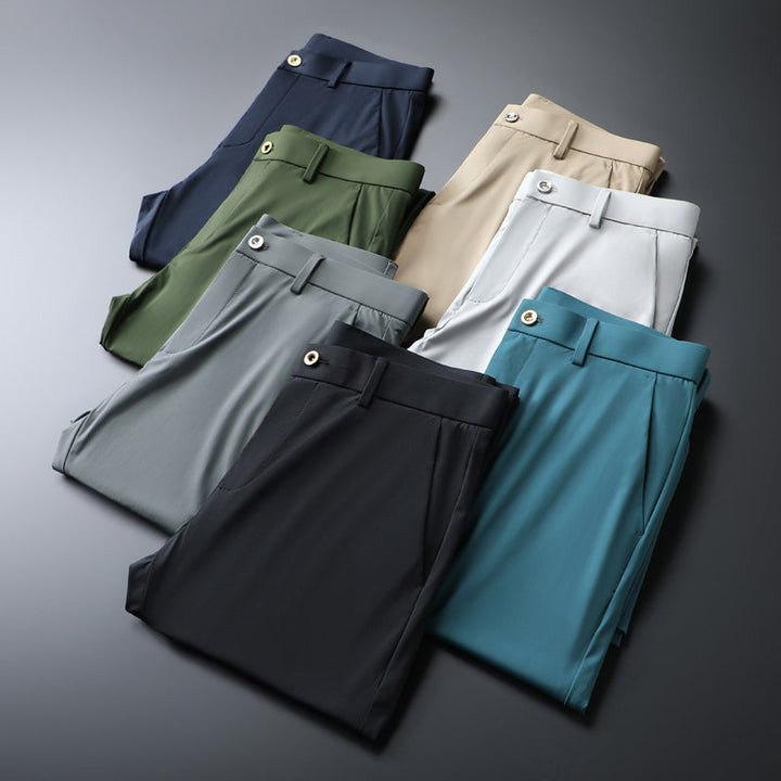 Man moving in men's stretch slim fit trousers, demonstrating freedom of movement.