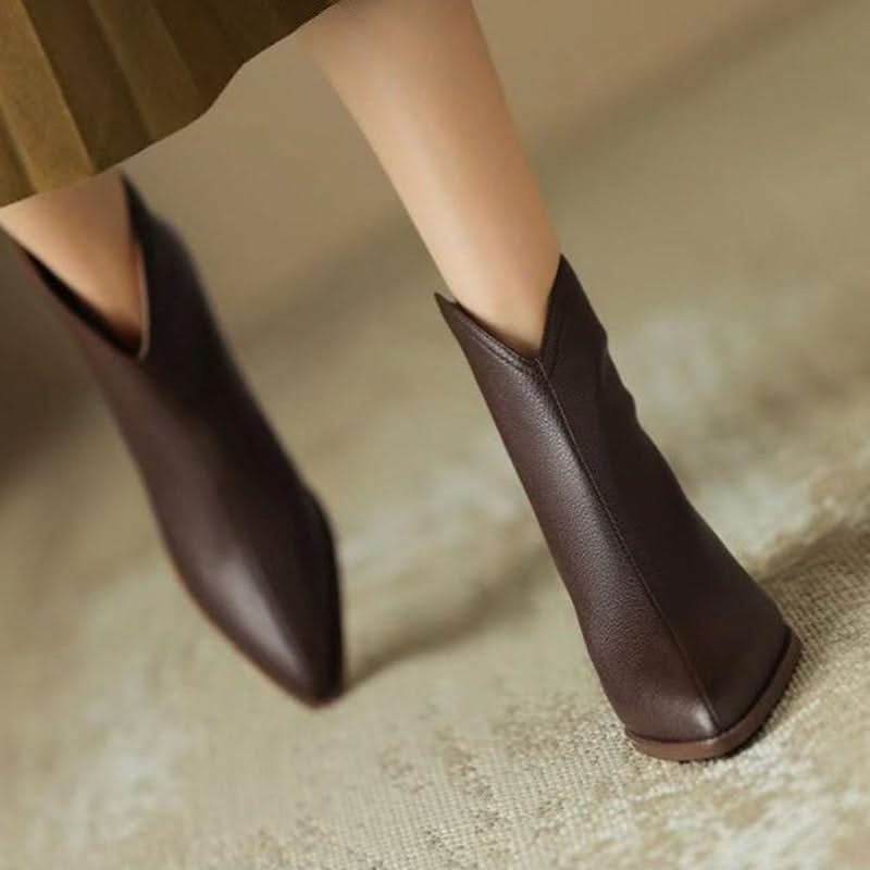 Elegant pointed toe ankle boots for women, designed for comfort and versatile everyday wear.