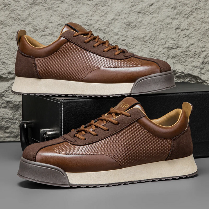 Sleek brown men's casual sneakers with ultimate comfort for city exploration.