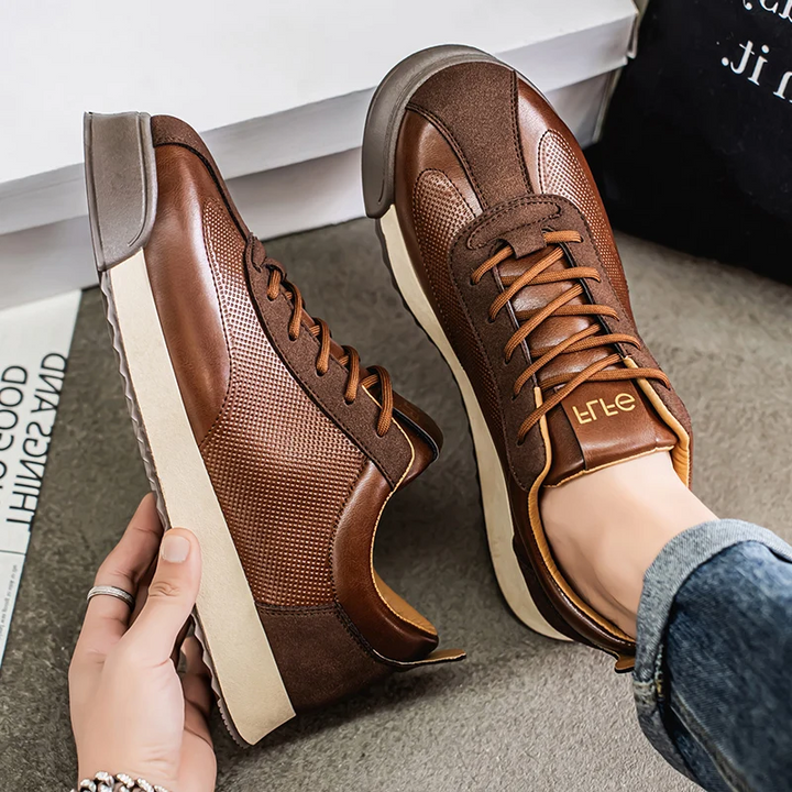 Sleek black men's footwear, these comfort sneakers are ideal for urban adventures.