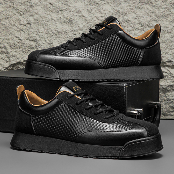 Black sleek men's urban sneakers, designed for superior comfort and style.