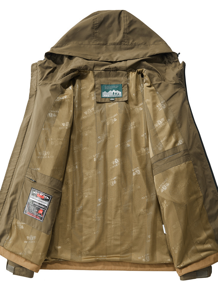 Close-up of men's tactical jacket material, highlighting durability. All-weather performance, lightweight design.