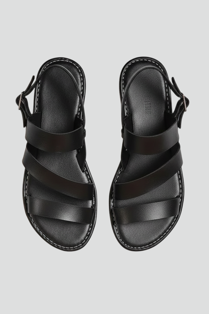 Women's effortless comfort flat sandals with secure back strap, perfect for everyday casual wear.