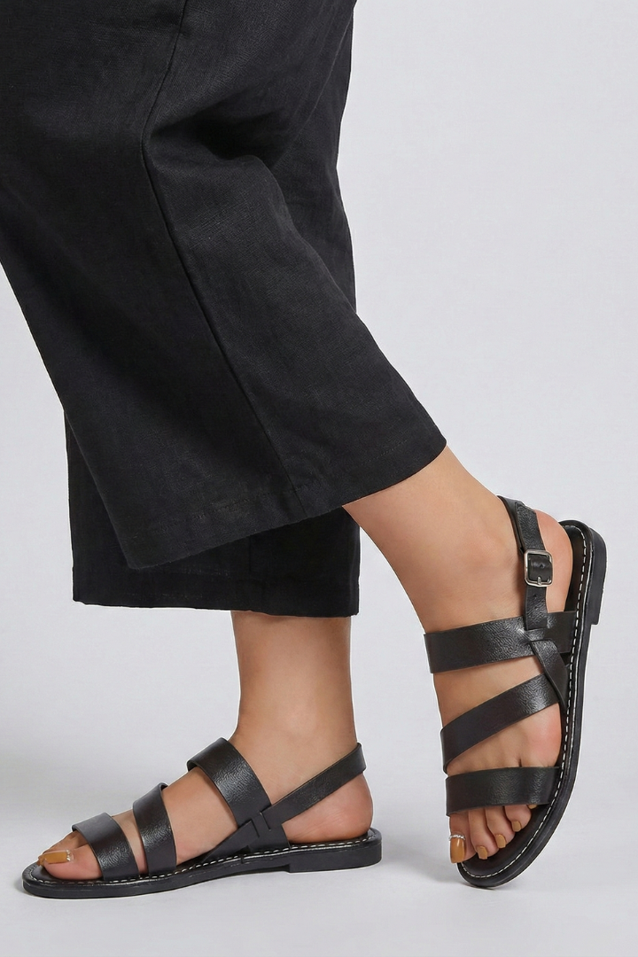 Versatile women's casual flat sandals with an open toe and secure back strap for all-day comfort.