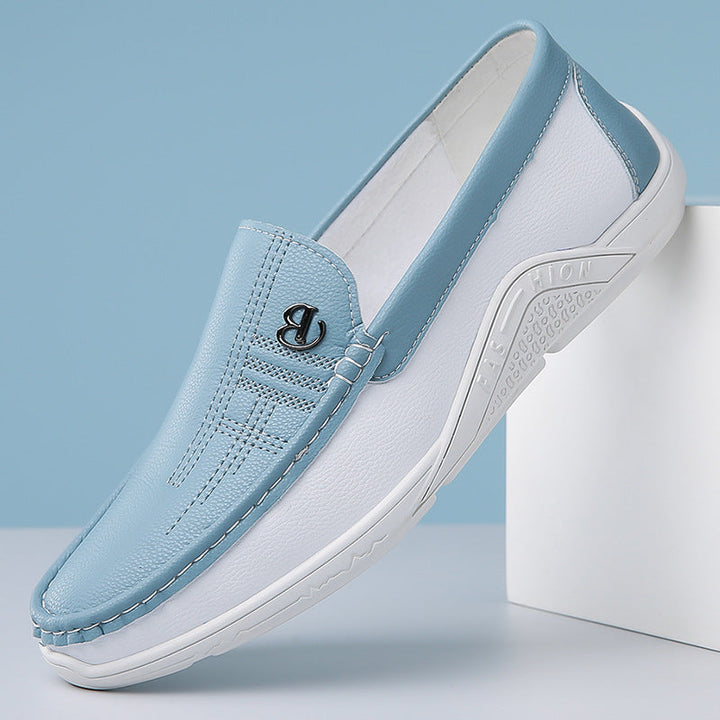 Effortless men's two-tone loafers, designed for sophisticated slip-on comfort and style.
