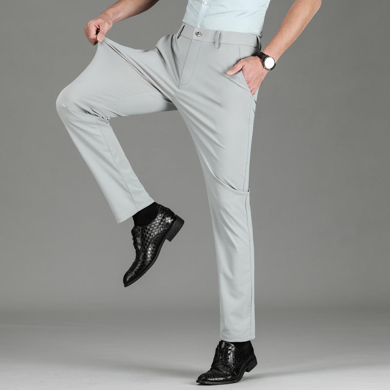 Back view of men's slim fit performance pants, highlighting the sleek silhouette.