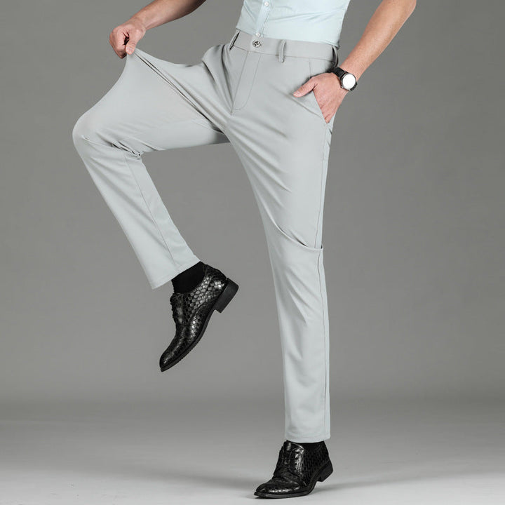 Back view of men's slim fit performance pants, highlighting the sleek silhouette.