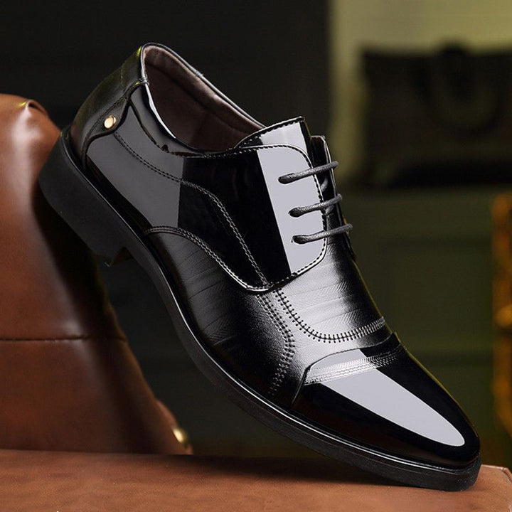 Luxurious men's two-tone oxford dress shoes, elegant classic formal footwear with a polished finish.