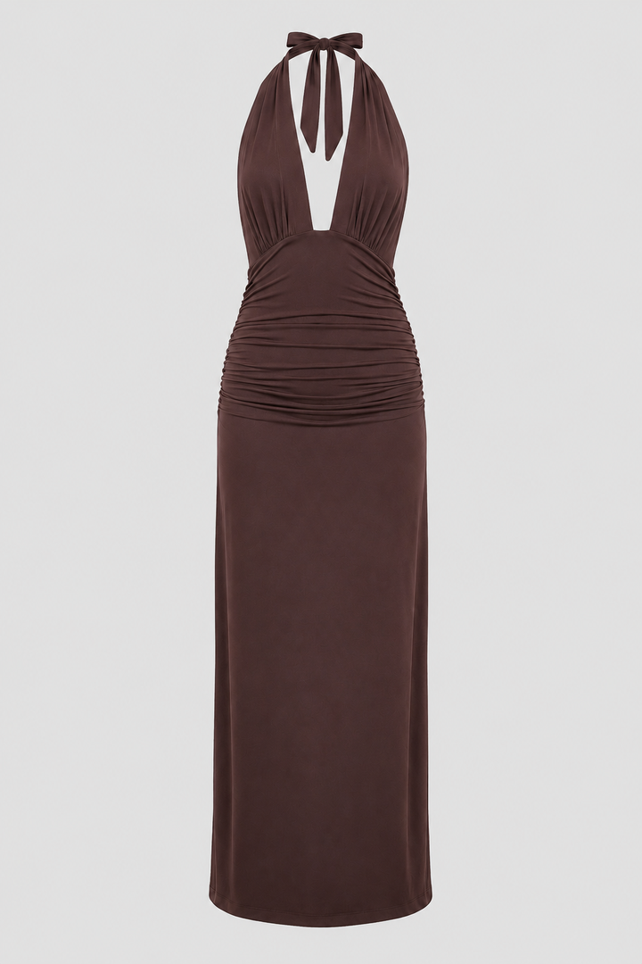 Flowing women's plunge halter maxi dress with open back. Elegant long evening gown for formal and party wear.