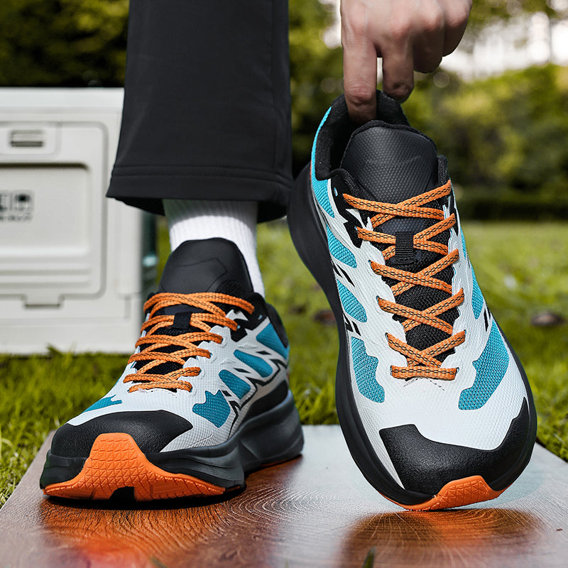 Close-up of men's Trailmark running shoes, highlighting breathable mesh & durable construction.