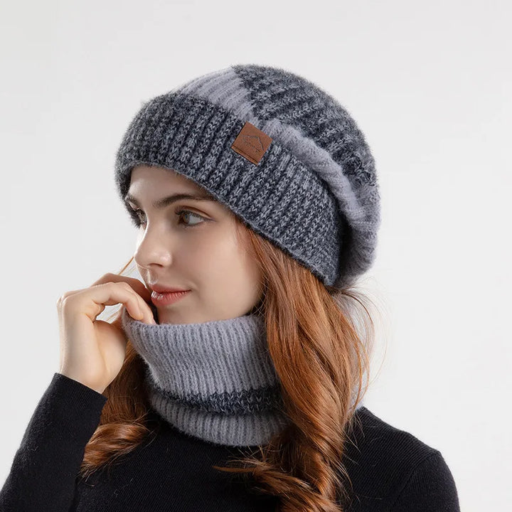 Comfortable acrylic neck warmer & beanie combo, perfect for cold weather activities. Essential winter hat & scarf set.