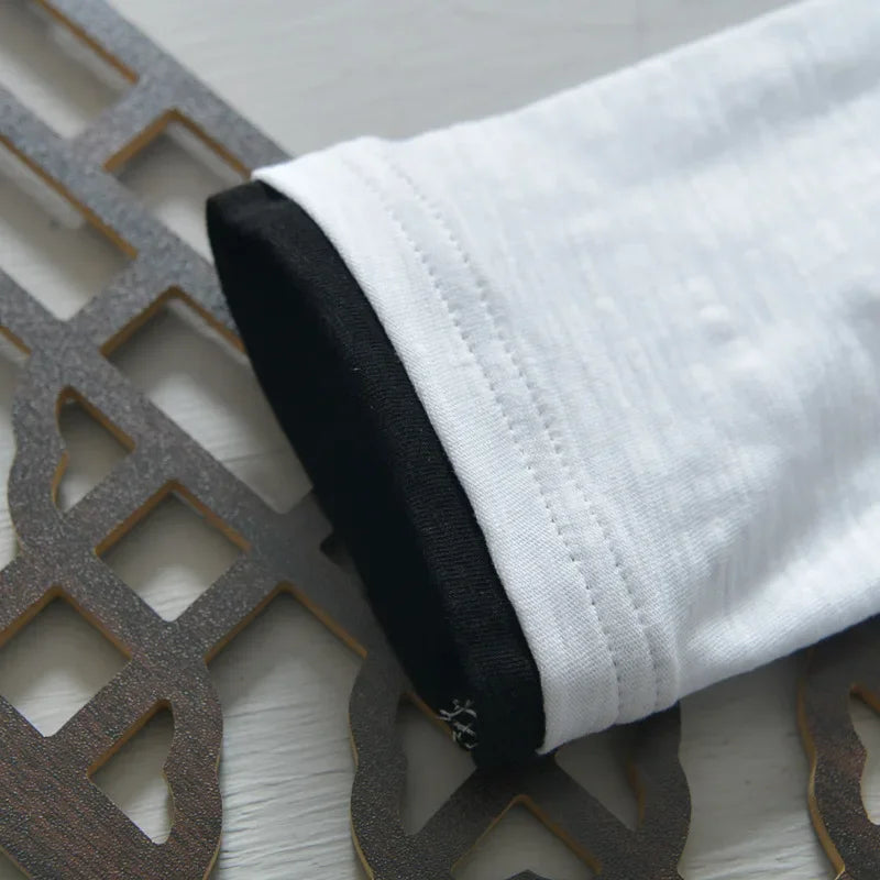 Stylish men's Nightfall shirt with distinctive vintage trim, tailored fit & long sleeves. A versatile button-up top.
