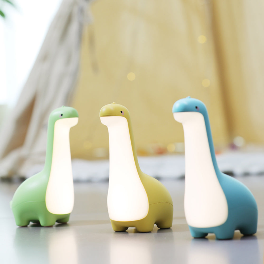 Child-friendly soft silicone dinosaur night light, rechargeable and safe, casts a gentle glow in kids' rooms.
