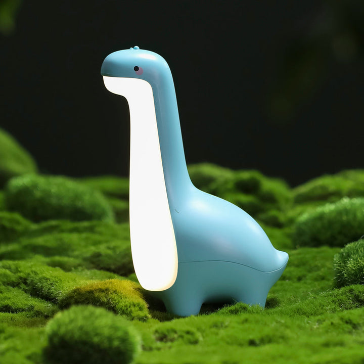 Tactile silicone dinosaur night lamp, rechargeable, offering a warm, soothing light for bedtime in nurseries.