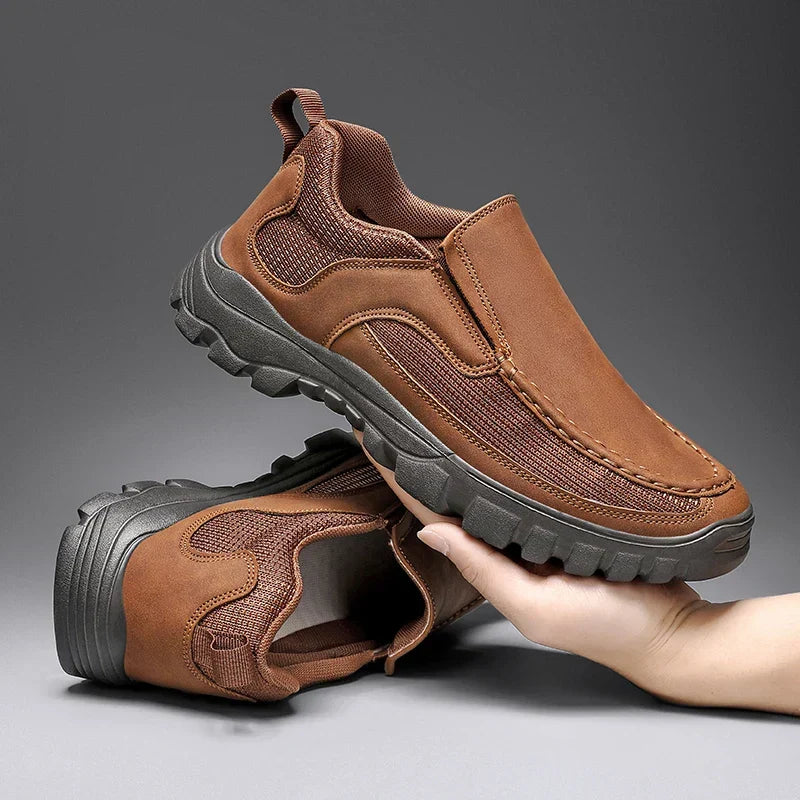 Stylish men's breathable leather loafers, ideal for everyday wear. Lightweight slip-on design for fashion.